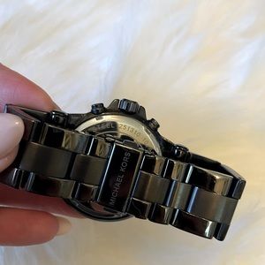 Micheal Kors oversized boyfriend watch. Pewter/Black in color, bling bezel